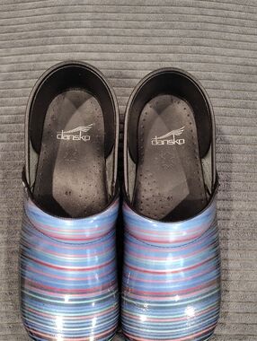 Dansko Blue Multi-Stripe Patent Clogs